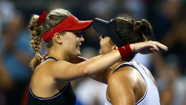 TORONTO, ON - AUGUST 06: Bianca Andreescu (R) of Canada hugs Eugenie Bouchard of Canada following her victory over Bouchard in a first round match on Day 4 of the Rogers Cup at Aviva Centre on August 06, 2019 in Toronto, Canada - Sputnik International