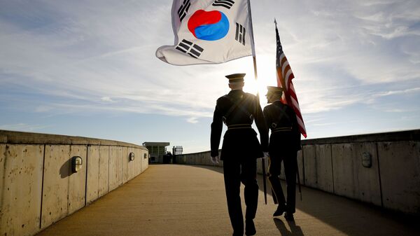 Members of the Honor Guard carry U.S. and South Korea flags after participating in the 2018 Security Consultative at the Pentagon, co-hosted by Defense Secretary Jim Mattis and South Korea Minister of Defense Jeong Kyeong-doo, Wednesday, Oct. 31, 2018 - Sputnik International