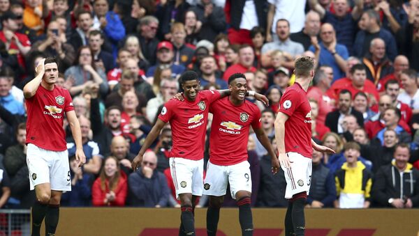 Manchester United's Anthony Martial, 2nd right, celebrates with teammates after scoring his sides second goal during the English Premier League soccer match between Manchester United and Chelsea at Old Trafford in Manchester, England, Sunday, Aug. 11, 2019 - Sputnik International