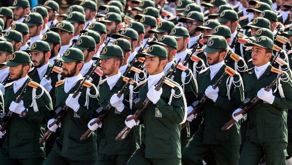 Members of Iran's Revolutionary Guards Corps (IRGC) march during the annual military parade marking the anniversary of the outbreak of the devastating 1980-1988 war with Saddam Hussein's Iraq, in the capital Tehran on September 22, 2018.  - Sputnik International