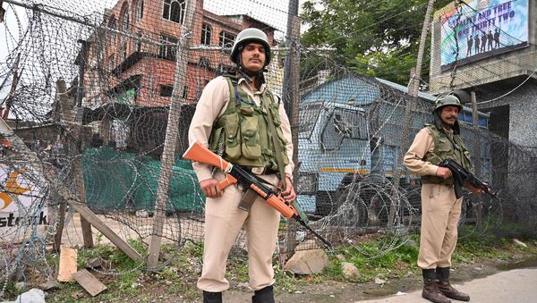 Indian paramilitary troopers stand guard in Srinagar on June 12, 2019, following an attack to a Central Reserve Police Force (CRPF) patrol were at least two Central CRPF personnel were killed during the suspected militant attack in south Kashmir's Anantnag district along the KP road - Sputnik International