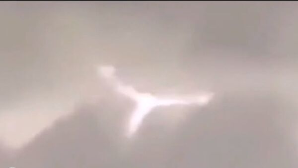 Angel-shaped UFO filmed in Brazil - Sputnik International