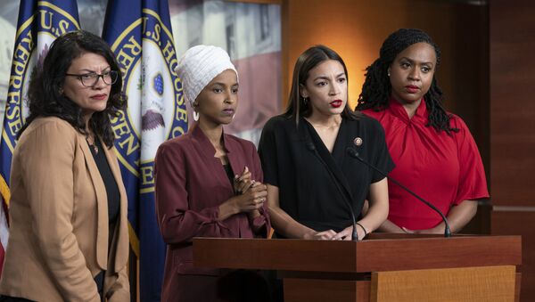 Rep. Rashida Tlaib, D-Mich., Rep. Ilhan Omar, D-Minn., Rep. Alexandria Ocasio-Cortez, D-N.Y., and Rep. Ayanna Pressley, D-Mass., respond to remarks by President Donald Trump after his call for the four Democratic congresswomen to go back to their broken countries. - Sputnik International