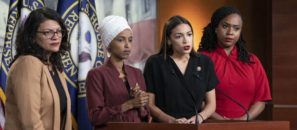 Democrat Representatives Rashida Tlaib (Michigan), Ilhan Omar (Minnesota), Alexandria Ocasio-Cortez (New York), and Ayanna Pressley (Massachusetts) respond to remarks by President Donald Trump after his call for the four Democratic congresswomen to go back to their broken countries. - Sputnik International