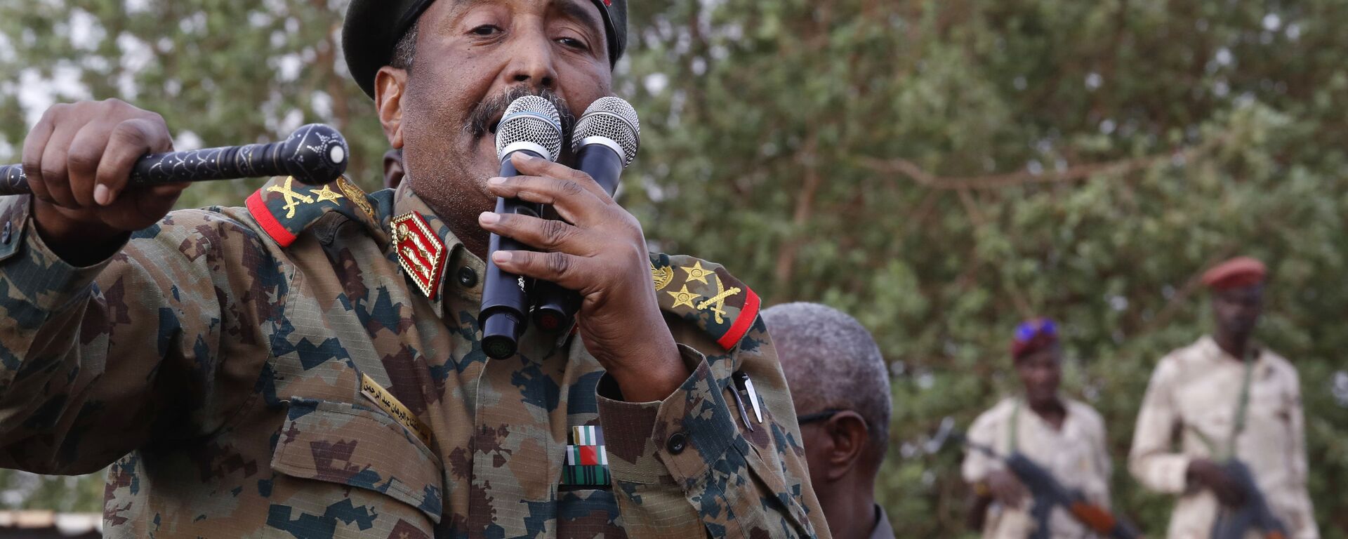 In this June 29, 2019, file photo, Sudanese Gen. Abdel-Fattah Burhan, head of the military council, speaks during a military-backed rally, in Omdurman district, west of Khartoum, Sudan. An African Union envoy says Sudan's ruling military council and the country's pro-democracy movement have reached a power-sharing agreement, including a timetable for a transition to civilian rule. Mohammed el-Hassan Labat said early Friday, July 5, that both sides agreed to form a joint sovereign council that will rule the country for three years or a little more. The sides agreed to five seats for the military and five for civilians with an additional seat going to a civilian with military background. - Sputnik International, 1920, 25.10.2021