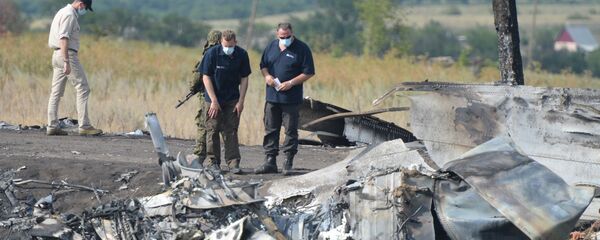 Organization for Security and Co-operation in Europe (OSCE) mission and aviation experts are working at the crash site of the Malaysian Boeing 777 Organization for Security and Co-operation in Europe (OSCE) mission and aviation experts are working at the crash site of the Malaysian Boeing 777 - Sputnik International