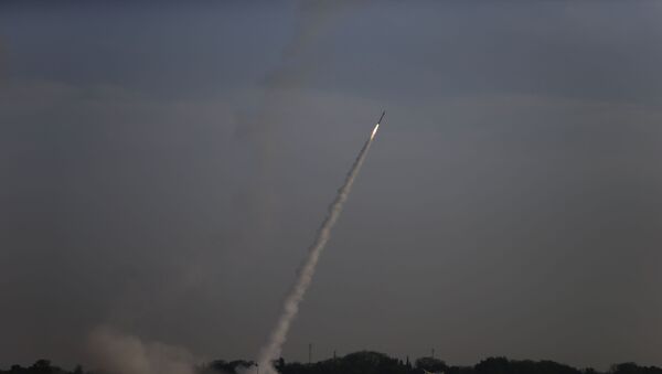 Israeli Iron Dome air defense system launches to intercept rocket from Gaza Strip, near Israel and Gaza border, Sunday, May 5, 2019. Palestinian militants in the Gaza Strip on Sunday intensified a wave of rocket fire into southern Israel, striking towns and cities across the region while Israeli forces struck dozens of targets throughout Gaza, including militant sites that it said were concealed in homes or residential areas - Sputnik International