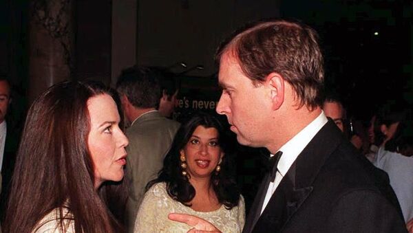 Prince Andrew (R) chats to his old flame, photographer Koo Stark, as they meet during a reception following his official opening of the Canon Photographic Gallery at the Victoria & Albert Museum in London this Tuesday evening, 19 MAY.  - Sputnik International
