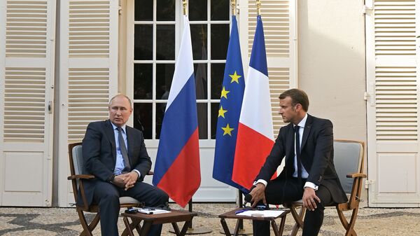 Russian President Vladimir Putin and French President Emmanuel Macron - Sputnik International