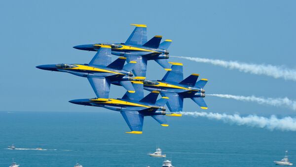The U.S. Navy flight demonstration squadron, the Blue Angels, perform the Diamond 360 maneuver at the Ocean City Air Show. The Blue Angels are scheduled to perform 68 demonstrations at 35 locations across the U.S. in 2015. - Sputnik International