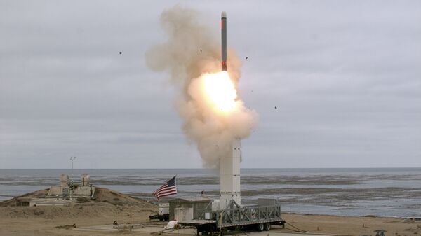 This US Department of Defense (DOD) handout photo shows, on 18 August, at 2:30 p.m. Pacific Daylight Time, when the Defense Department conducted a flight test on a conventionally configured ground-launched cruise missile on San Nicolas Island, California. - The test missile exited its ground-based mobile launcher and accurately impacted its target after flying over 500 kilometres. Data collected and lessons learned from this test will inform the DOD's development of future intermediate-range capabilities.   - Sputnik International