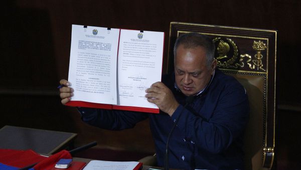 Venezuela's President of the National Constituent Assembly Diosdado Cabello shows a document protesting U.S. sanctions during a session by the legislative body that is stacked with government allies that rivals the opposition-controlled National Assembly in Caracas, Venezuela, Monday, Aug. 12, 2019. The United States froze all Venezuelan government assets in the U.S., putting the country on a short list of U.S. adversaries. Venezuela's President of the National Constituent Assembly Diosdado Cabello shows a document protesting U.S. sanctions during a session by the legislative body that is stacked with government allies that rivals the opposition-controlled National Assembly in Caracas, Venezuela, Monday, Aug. 12, 2019. The United States froze all Venezuelan government assets in the U.S., putting the country on a short list of U.S. adversaries. - Sputnik International