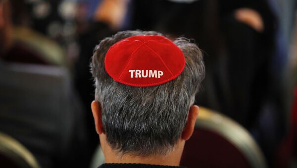 An attendee wears a yarmulke with the word Trump before President Donald Trump speaks at an annual meeting of the Republican Jewish Coalition - Sputnik International