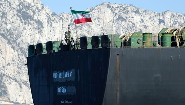 An Iranian flag flutters on board the Adrian Darya oil tanker, formerly known as the Grace 1, off the coast of Gibraltar on 18 August 2019. - Sputnik International