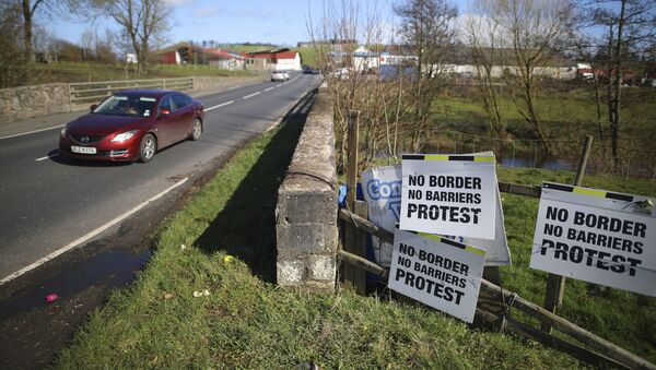 A Motorist crosses the Irish border in Middletown, Northern Ireland, Tuesday, March, 12, 2019. The issue of a possible physical border between the United Kingdom's Northern Ireland and the Republic of Ireland, an EU state, received scant attention during the 2016 Brexit referendum. But it has proven to be a major stumbling block in the British government's quest for a divorce deal.  - Sputnik International
