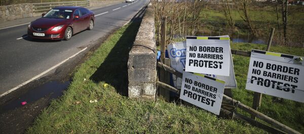 A Motorist crosses the Irish border in Middletown, Northern Ireland, Tuesday, March, 12, 2019. The issue of a possible physical border between the United Kingdom's Northern Ireland and the Republic of Ireland, an EU state, received scant attention during the 2016 Brexit referendum. But it has proven to be a major stumbling block in the British government's quest for a divorce deal.  - Sputnik International