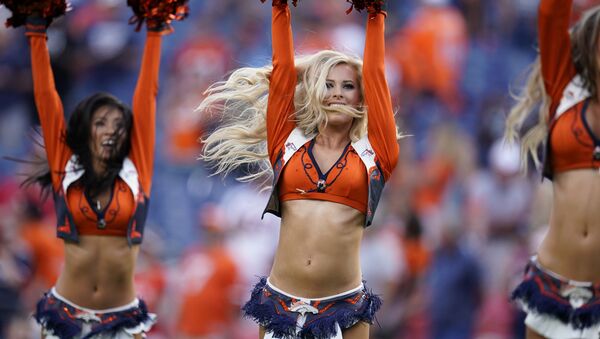 The Denver Broncos cheerleaders perform during an NFL preseason football game against the San Francisco 49ers, Monday, Aug. 19, 2019, in Denver.  - Sputnik International