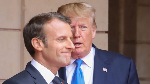FILE PHOTO: French President Emmanuel Macron speaks with US President Donald Trump on the sidelines of commemorations marking the 75th anniversary of the World War II D-Day landings in Normandy, France,  6 June 2019 - Sputnik International