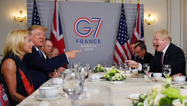 U.S. President Donald Trump and Britain's Prime Minister Boris Johnson hold a bilateral meeting during the G7 summit in Biarritz, France, August 25, 2019.  - Sputnik International