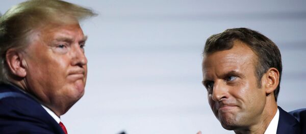 French President Emmanuel Macron and U.S. President Donald Trump react during a news conference at the end of the G7 summit in Biarritz, France - Sputnik International