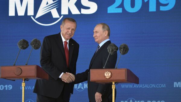 Russian President Vladimir Putin and Turkish President Recep Tayyip Erdogan shake hands during the opening of the MAKS-2019 International Aviation and Space Salon in Zhukovsky outside Moscow, Russia, August 27, 2019 - Sputnik International
