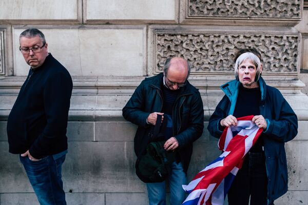 A woman dons Theresa May's mask (UK photographer Bojan Nikolic, 3rd place at London photograph category) - Sputnik International