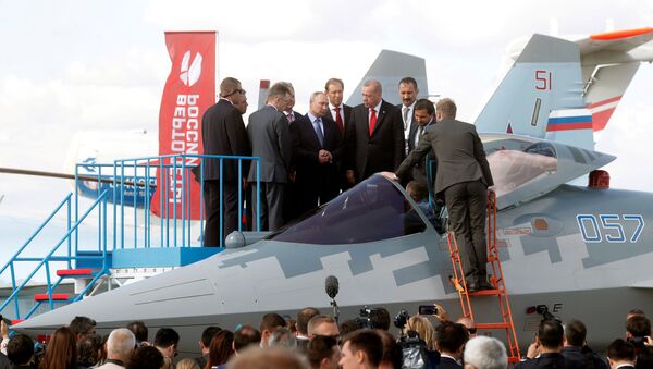 Russian President Vladimir Putin, Russian Industry and Trade Minister Denis Manturov and Turkish President Recep Tayyip Erdogan inspect a Sukhoi Su-57 fifth-generation fighter during the MAKS-2019 International Aviation and Space Salon in Zhukovsky outside Moscow, Russia, August 27, 2019 - Sputnik International