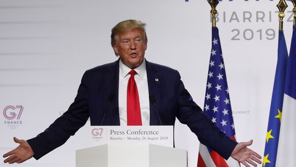U.S. President Donald Trump attends a joint press conference with French President Emmanuel Macron (not seen) at the end of the G7 summit in Biarritz, France, August 26, 2019. - Sputnik International