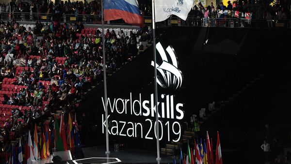 Russian and WorldSkills flags flutter during the closing ceremony of the WorldSkills Kazan 2019 Competition at Kazan Arena in Kazan, Russia - Sputnik International