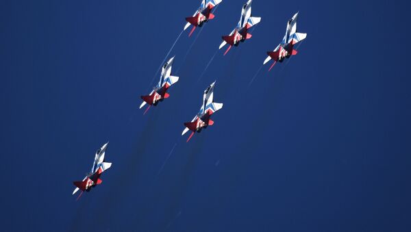 MiG-29 fighter jets piloted by the Swifts aerobatic team perform at the MAKS-2019 international air show in Zhukovsky, outside Moscow. - Sputnik International