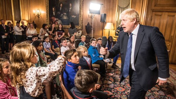 British Prime Minister Boris Johnson takes questions from children aged 9-14 during an education announcement inside Downing Street in London, Britain, August 30, 2019.  - Sputnik International