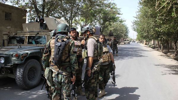 Afghan soldiers gather at a street in Kunduz on August 31, 2019. - Afghan security forces repelled a coordinated Taliban assault on the northern city of Kunduz on August 31, President Ashraf Ghani said, amid competing claims from the insurgents.  - Sputnik International