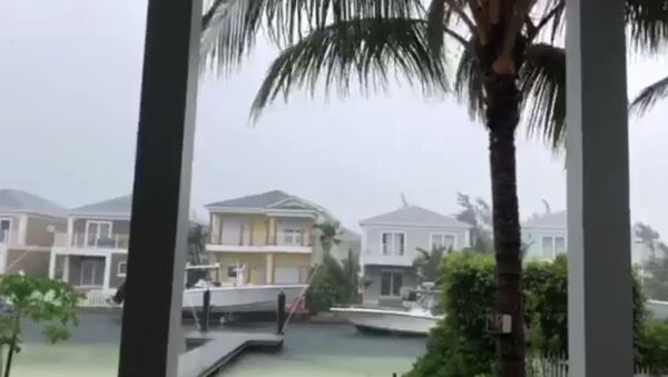 This video grab image shows boats are tied up in preparation for the approach of Hurricane Dorian on September 1, 2019 in Sandyport, Nassau, Bahamas. - Sputnik International