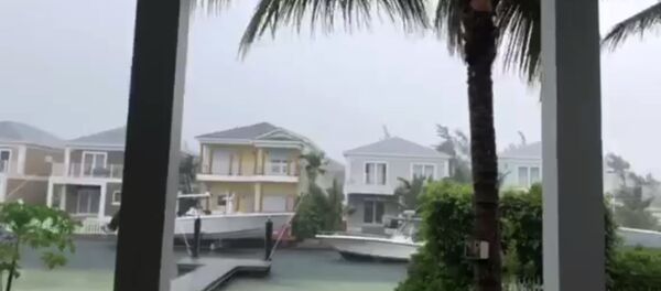 This video grab image shows boats are tied up in preparation for the approach of Hurricane Dorian on September 1, 2019 in Sandyport, Nassau, Bahamas. - Sputnik International