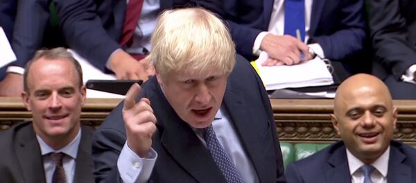Britain's Prime Minister Boris Johnson gestures as he speaks during the weekly question time debate in Parliament in London, Britain, September 4, 2019 - Sputnik International