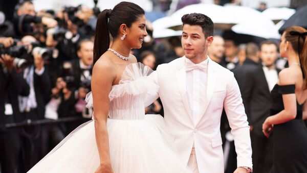 Actress Priyanka Chopra, left, and Nick Jonas pose for photographers upon arrival at the premiere of the film 'The Best Years of a Life' at the 72nd international film festival, Cannes, southern France, Saturday, May 18, 2019 - Sputnik International