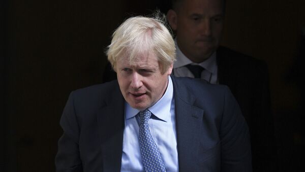 Britain's Prime Minister Boris Johnson leaves 10 Downing Street, London, for the House of Commons to attend the weekly Prime Minister's question time, Wednesday, Sept. 4, 2019 - Sputnik International
