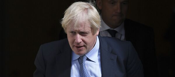 Britain's Prime Minister Boris Johnson leaves 10 Downing Street, London, for the House of Commons to attend the weekly Prime Minister's question time, Wednesday, Sept. 4, 2019 - Sputnik International
