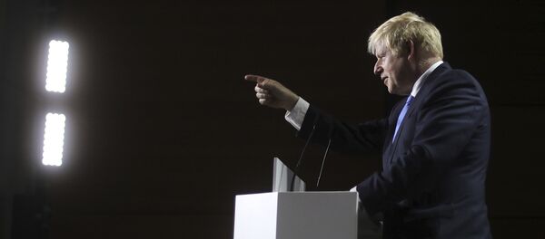 Britain's Prime Minister Boris Johnson gestures as he speaks during a press conference on the third and final day of the G-7 summit in Biarritz, France Monday, Aug. 26, 2019 - Sputnik International