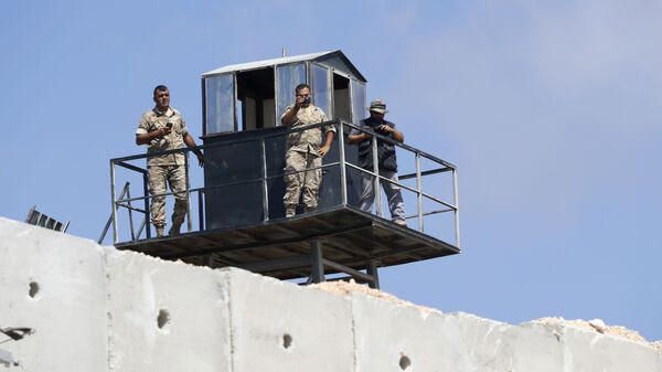 Lebanese soldiers on a watch tower along a new wall on the Israeli-Lebanese border (File) - Sputnik International