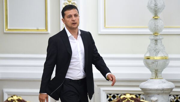 Ukrainian President Volodymyr Zelensky arrives for a meeting with the new members of the government and new president of Parliament, in Kiev on September 2, 2019 - Sputnik International