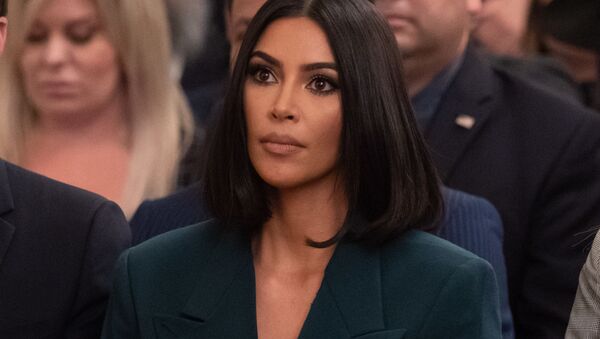 Kim Kardashian listens as US President Donald Trump speaks about  second chance hiring and criminal justice reform in the East Room of the White House in Washington, DC, June 13, 2019.  - Sputnik International