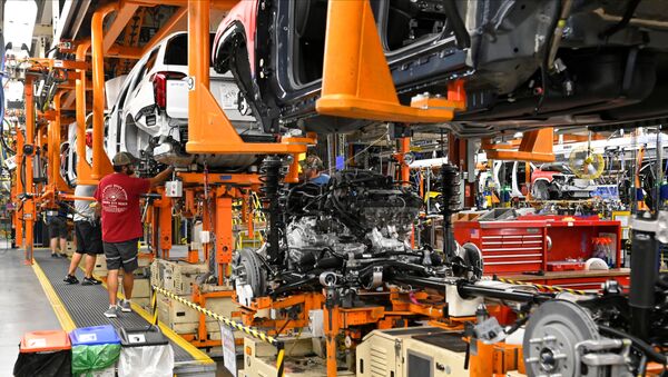 The engine and drive train are pictured with the body on the assembly line at the General Motors (GM) manufacturing plant in Spring Hill, Tennessee, U.S., August 22, 2019 - Sputnik International