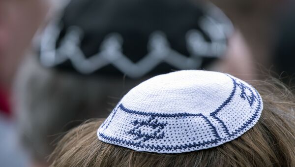People of different faiths wear the Jewish kippah during a demonstration against antisemitism in Germany in Erfurt, Germany, Wednesday, April 25, 2018. - Sputnik International