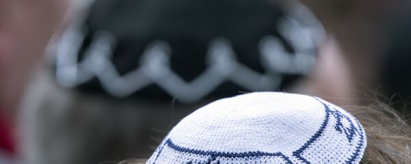 People of different faiths wear the Jewish kippah during a demonstration against antisemitism in Germany in Erfurt, Germany, Wednesday, April 25, 2018. People of different faiths wear the Jewish kippah during a demonstration against antisemitism in Germany in Erfurt, Germany, Wednesday, April 25, 2018. - Sputnik International