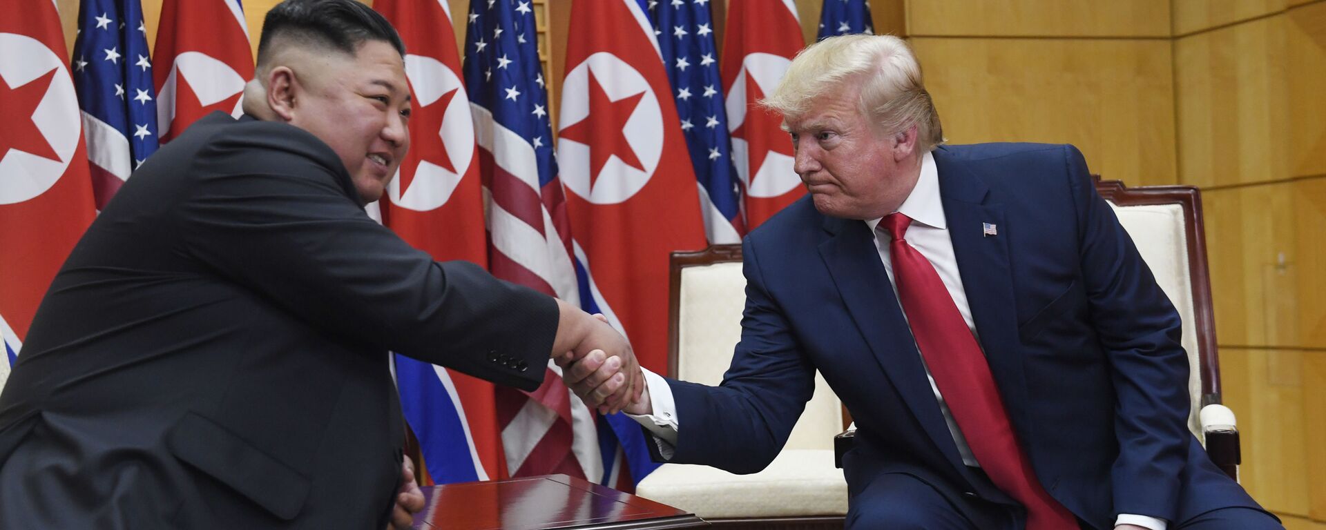 President Donald Trump meets with North Korean leader Kim Jong Un at the border village of Panmunjom in the Demilitarized Zone, South Korea, Sunday, June 30, 2019. - Sputnik International, 1920, 10.02.2022