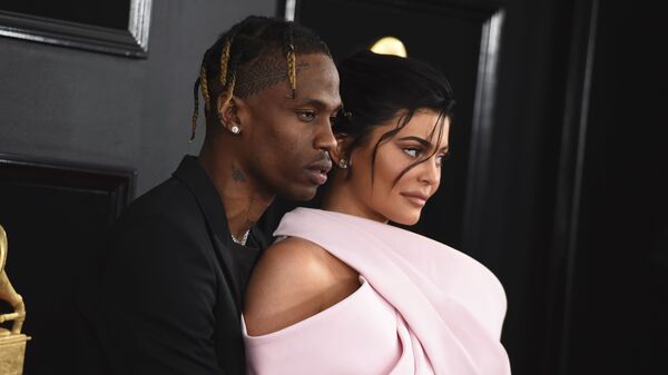 Travis Scott, left, and Kylie Jenner arrive at the 61st annual Grammy Awards at the Staples Center on Sunday, Feb. 10, 2019, in Los Angeles - Sputnik International