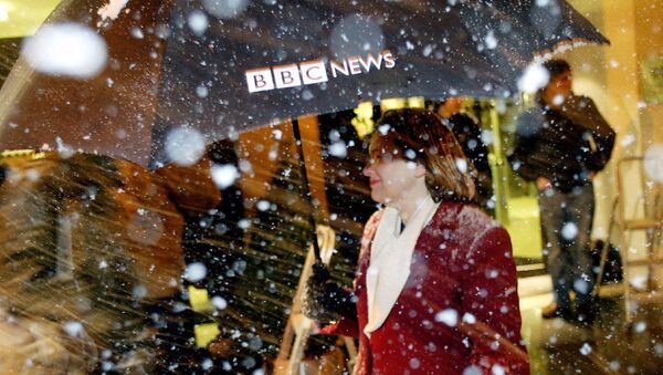 An employee leaves the BBC offices on Portland Place after the release of the Hutton Report lead to the resignation of BBC Chairman Gavyn Davies in London 28 January, 2004 - Sputnik International