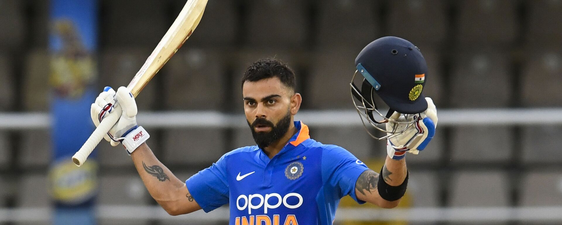 Virat Kohli of India celebrates his century during the 3rd ODI match between West Indies and India at Queens Park Oval, Port of Spain, Trinidad and Tobago, on August 14, 2019 - Sputnik International, 1920, 16.07.2021