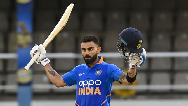Virat Kohli of India celebrates his century during the 3rd ODI match between West Indies and India at Queens Park Oval, Port of Spain, Trinidad and Tobago, on August 14, 2019 - Sputnik International